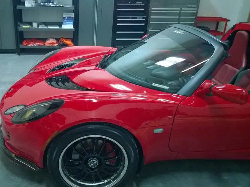 Sports car inside the private Mica Specialties automotive technology facility in Panama City